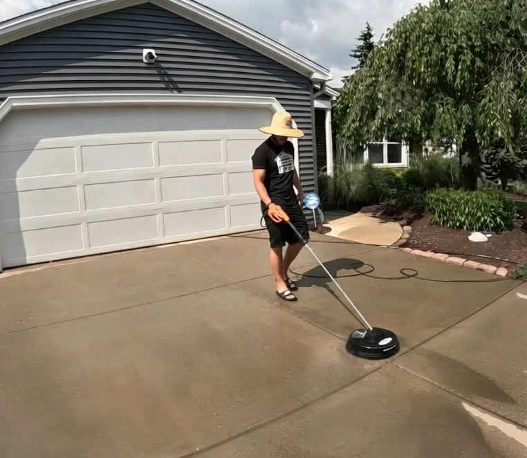 Concrete restoration and driveway cleaning using rotary surface cleaner