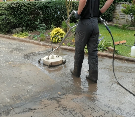 Pressure cleaning paver driveway using rotary surface cleaner attachment